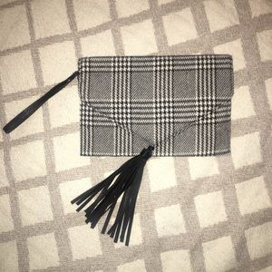 Carlos Santana houndstooth clutch